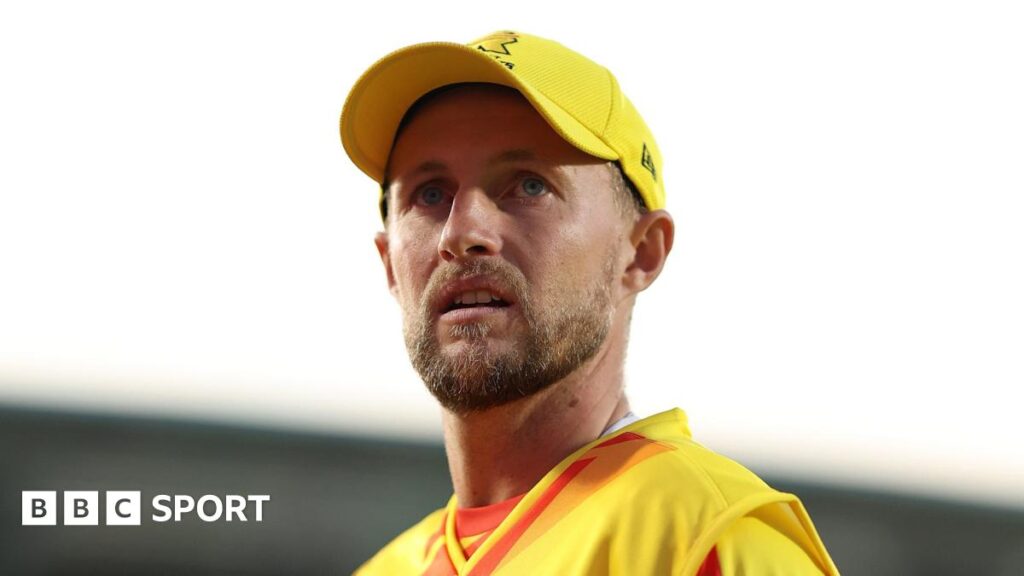Jordan Cox of Oval Invincibles fist pumps holding a cricket bat