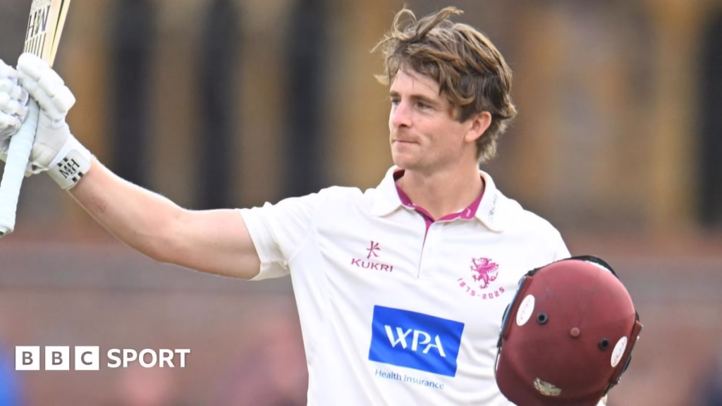 Tom Abell raises his bat after reaching his hundred against Yorkshire
