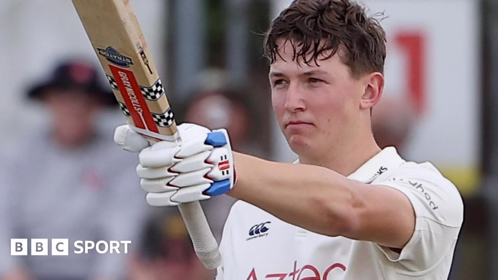 Ben McKinney celebrates scoring century