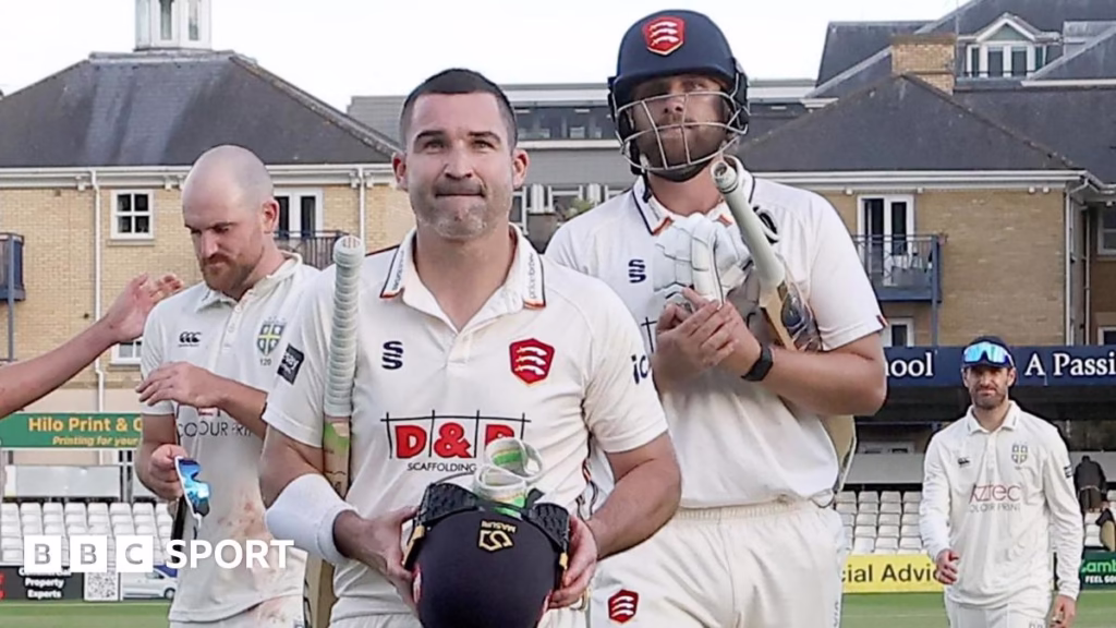 Essex players leave the field