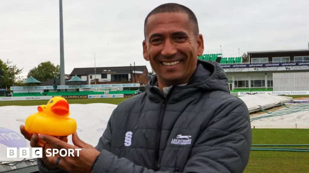 Alfonso Thomas holding a rubber duck