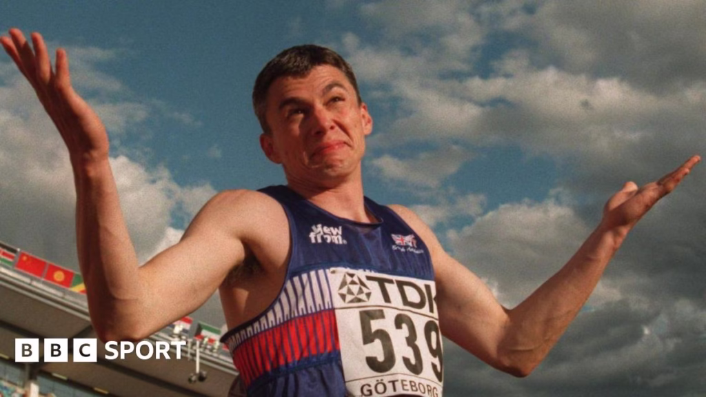 Jonathan Edwards celebrates after setting the triple jump world record in 1995