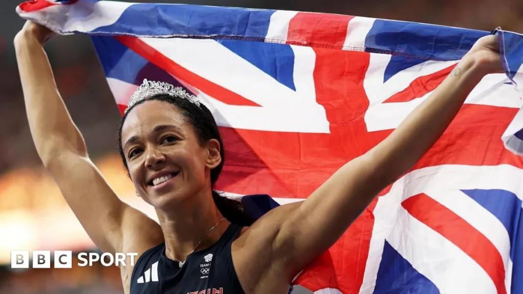 Katarina Johnson-Thompson receives medical attention after suffering an injury at Tokyo 2020