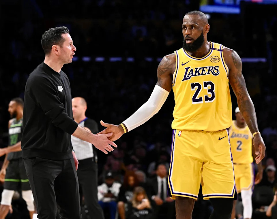 Los Angeles, CA - April 30:  Head coach JJ Redick of the Los Angeles Lakers high fives LeBron #23 of the Los Angeles Lakers
 in the first half of game 5 of a first round NBA basketball game against the Minnesota Timberwolves
at Crypto.com Arena in Los Angeles on Wednesday, April 30, 2025.  (Photo by Keith Birmingham/MediaNews Group/Pasadena Star-News via Getty Images)