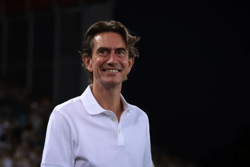 Thomas Frank smiles during Spurs' UEFA Super Cup encounter with PSG