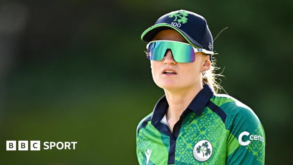 Gaby Lewis, wearing sunglasses and a cap, in the field for a recent Ireland match
