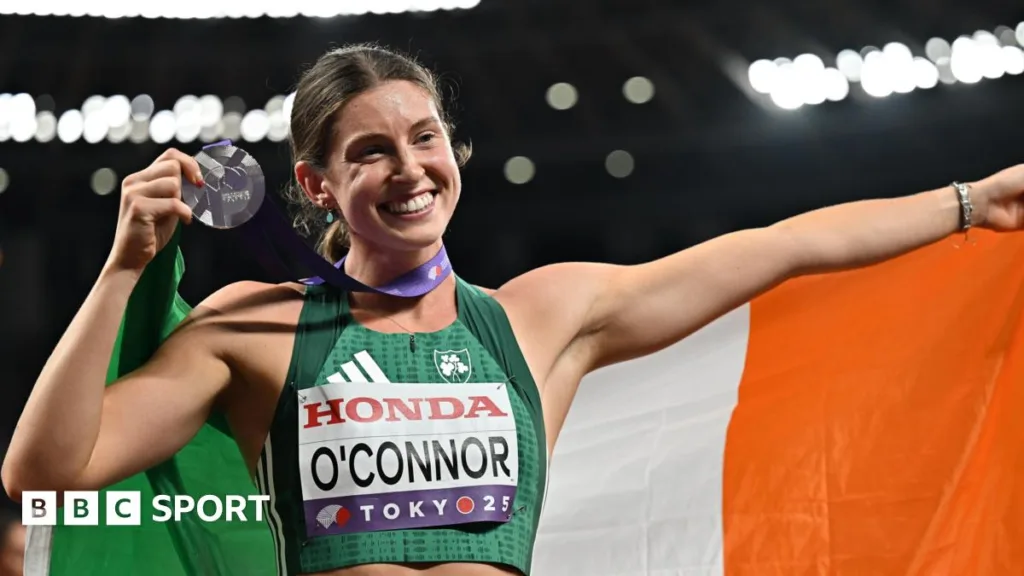 Kate O'Connor poses with her silver medal