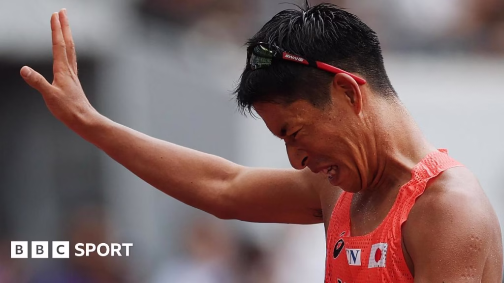 Japan's Hayato Katsuki grimaces after winning world bronze in the men's 35km race walk in Tokyo