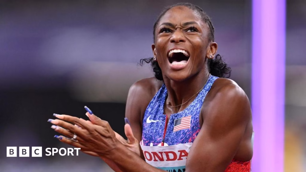 Melissa Jefferson-Wooden celebrates after winning world 100m gold